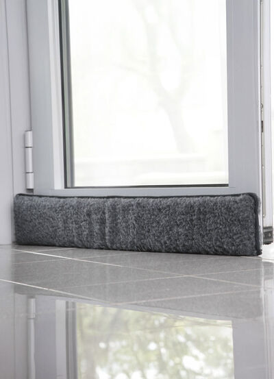 Dragskydd i ny ull för dörrar 