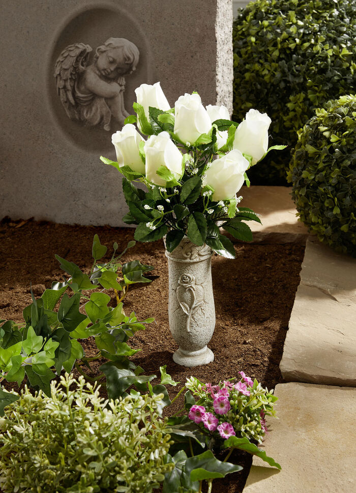 gravvas med arrangemang 