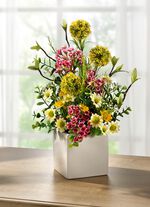 Arrangemang i vit keramikkruka 