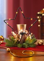 Dekorerad v&auml;rmeljush&aring;llare i metall med LED-belysning 