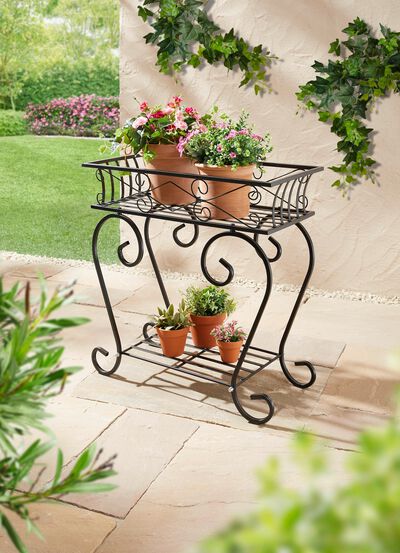 v&auml;xtst&auml;ll av metall 