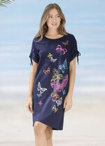 Kl&auml;nning med placerat tryck och rynkbara &auml;rmar 