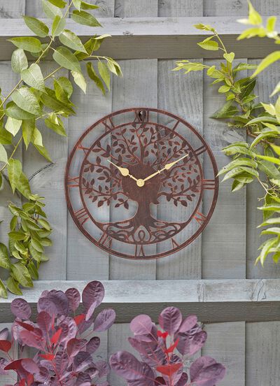 V&auml;ggklocka med motiv av livets tr&auml;d 