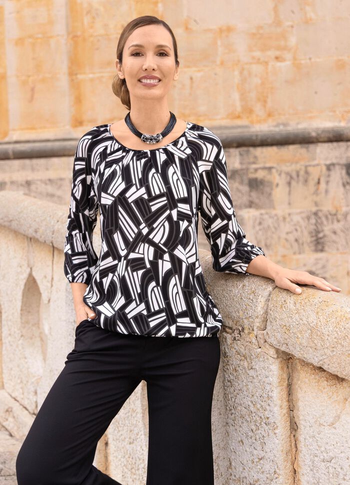 Tunika med elastiska muddar 