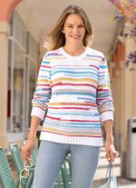 Tr&ouml;ja i en blandning av stickningar och m&ouml;nster 