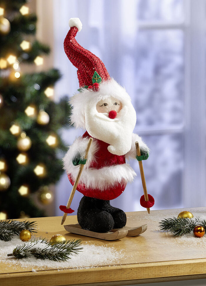 Jultomten på skidor 