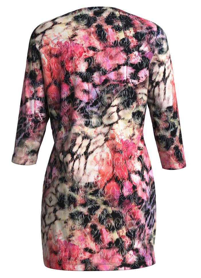 Stickad tunika med diskreta glitterdetaljer 