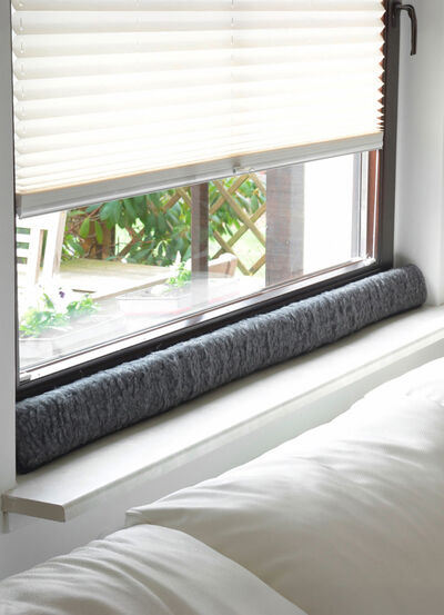 Dragskydd i ull för fönster 