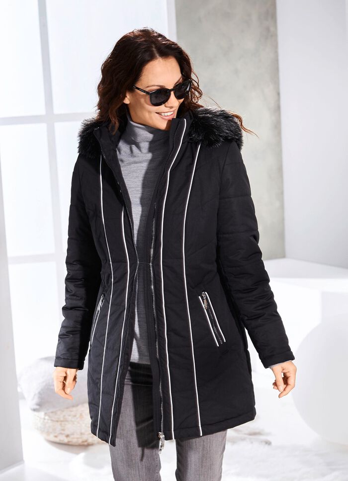 Jacka med kontrasterande passpoaler 