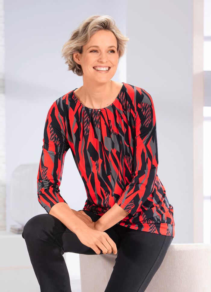 Skjorta med &ouml;gleknappst&auml;ngning 