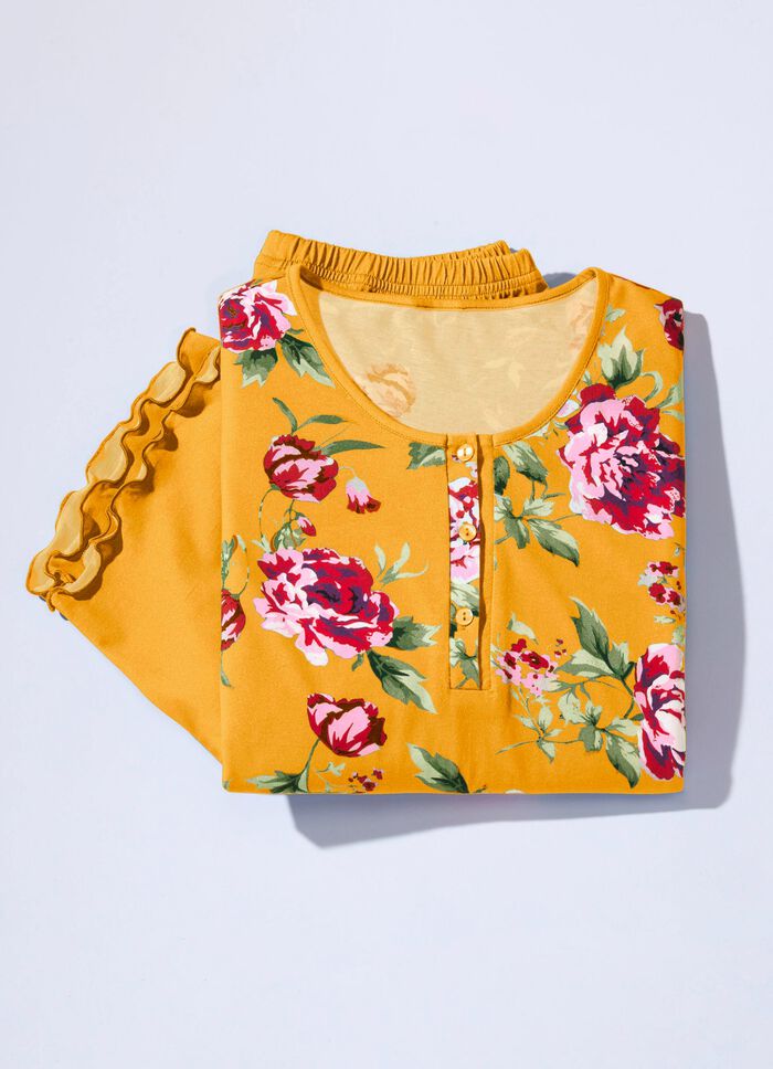 Tv&aring; paket pyjamas med sv&auml;ngda muddar och knappsl&aring; 