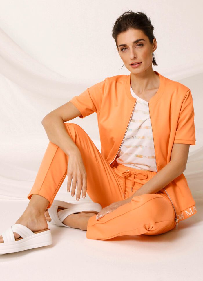 Mjukisjacka med ribbade &auml;rmslut 