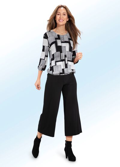 Skjorttunika med dekorativa knappar 