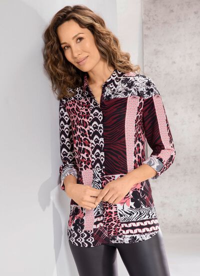 Blus med bl&auml;ckstr&aring;letryck 