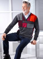 Intressant V-ringad tr&ouml;ja med grafiskt m&ouml;nster 