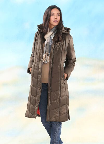 Kappa med sidoslitsar med dragkedja 