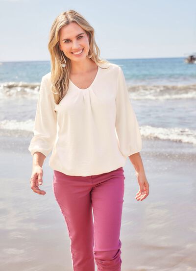 Tunika med dekorativa veck 