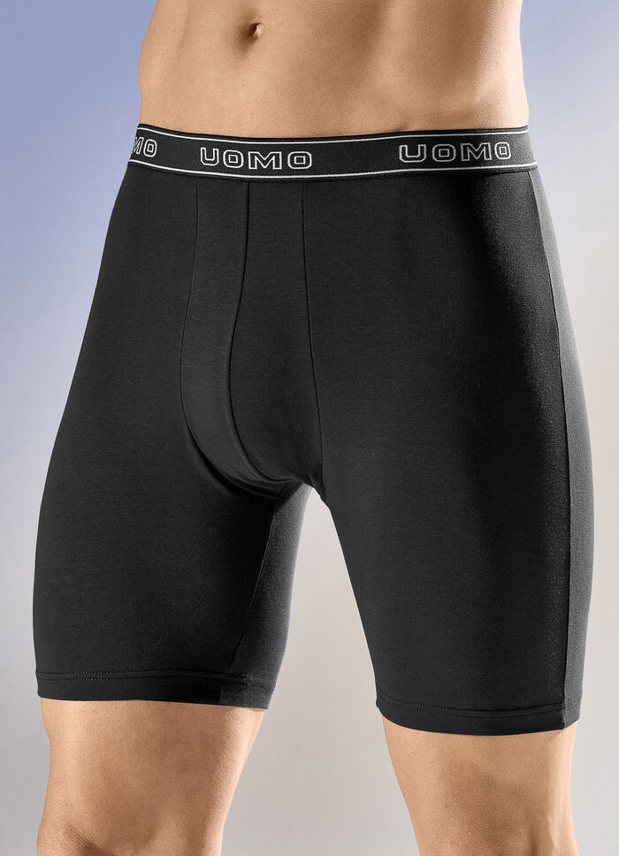 Paket med fyra långbyxor med resår i midjan 