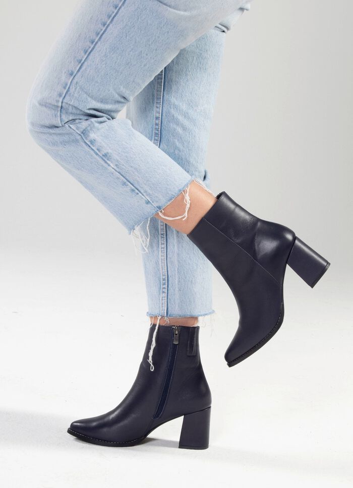 Andrea Conti st&ouml;vletter med elastiskt band i sidan 