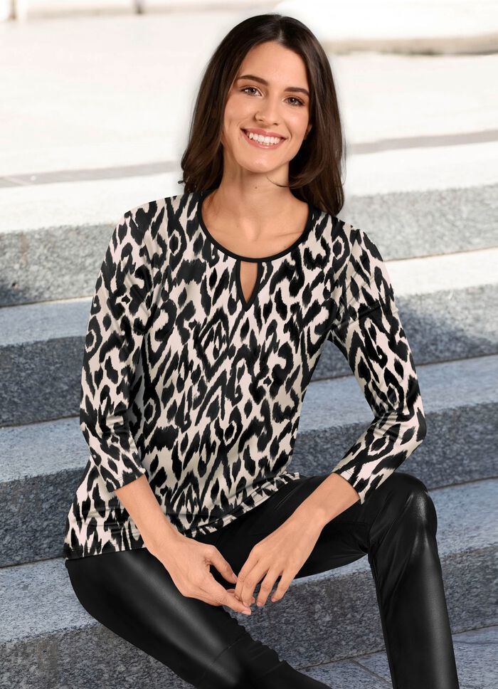 Helm&ouml;nstrad topp med rund halsringning 