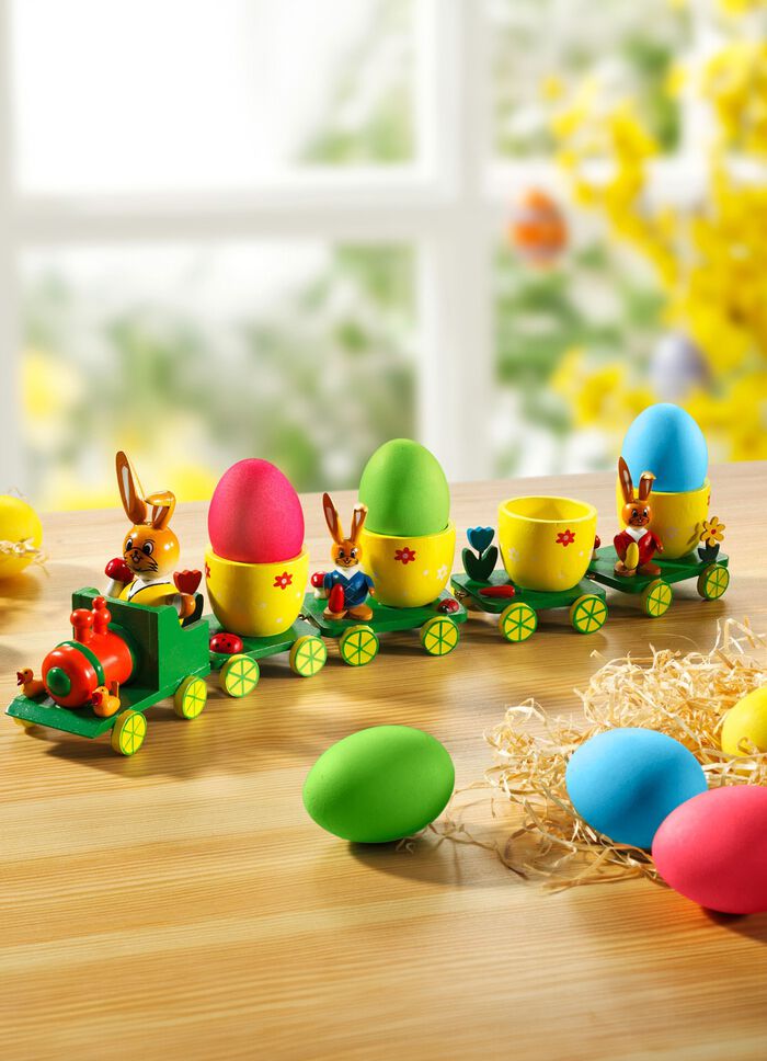 P&aring;skt&aring;g med vagnar som fungerar som &auml;ggkoppar 