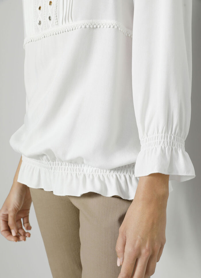 Slip-on blus med volanger 