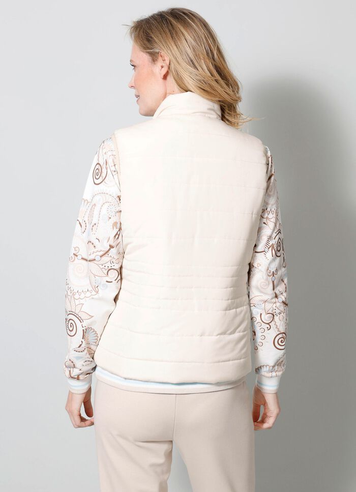 V&auml;ndbar v&auml;st med fickor med dragkedja 