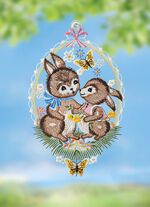 F&ouml;nsterbild med ett par kaniner gjorda av Plauener Spitze 