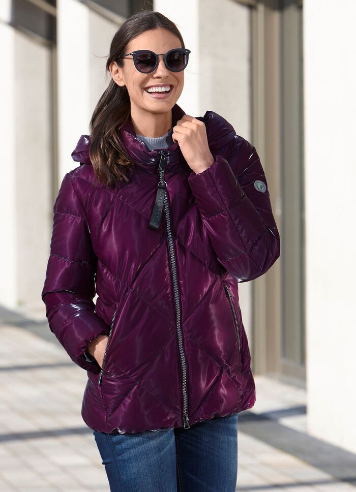 Funktionell jacka med avtagbar huva 