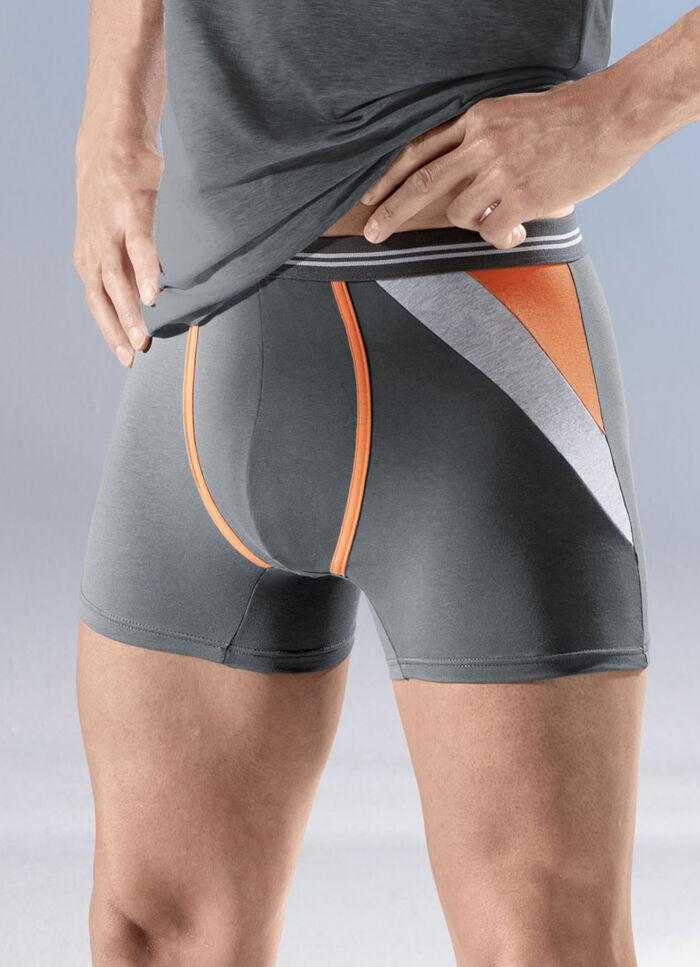 Fyrapack byxor med färgade inlägg 