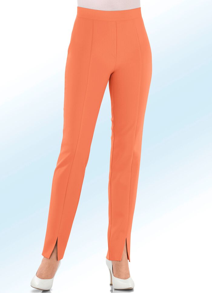 Byxor med trendiga benslitsar 