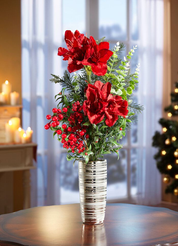 Amaryllisarrangemang i vas 