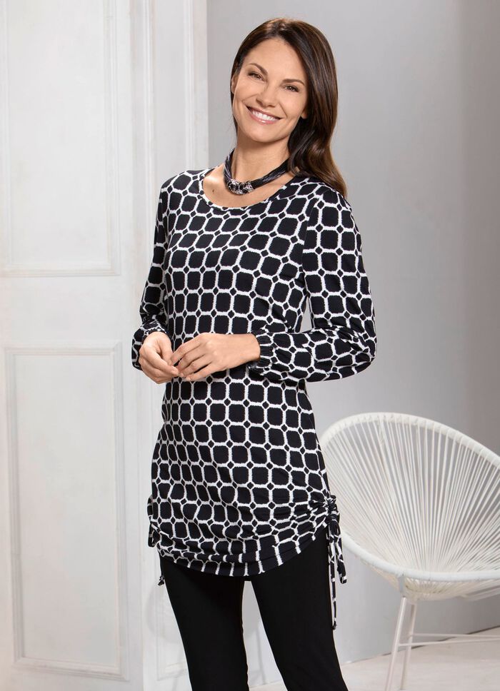 Unik l&aring;ng skjorta med sidoslitsar 