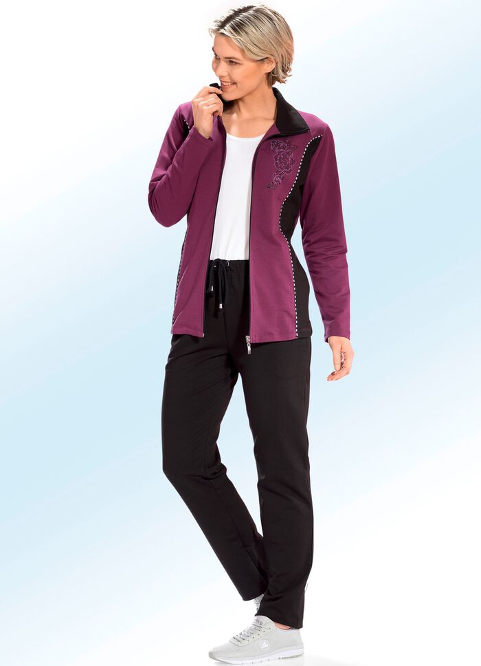 Fritidsdress med kontrasterande insidor och dekorativa passpoaler 