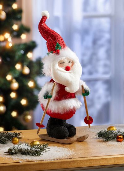 Jultomten p&aring; skidor 