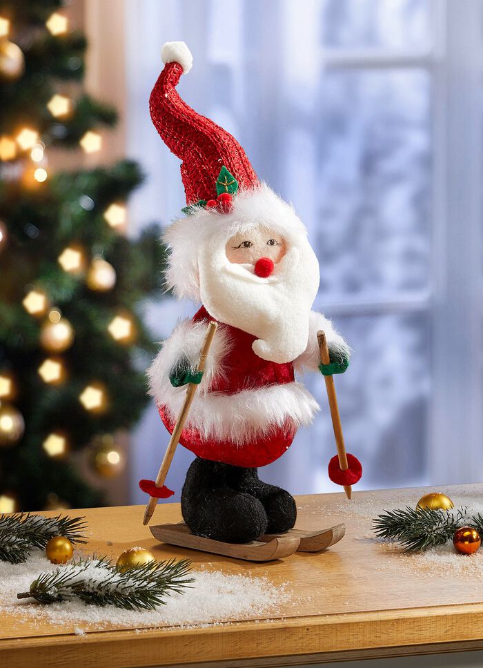 Jultomten p&aring; skidor 