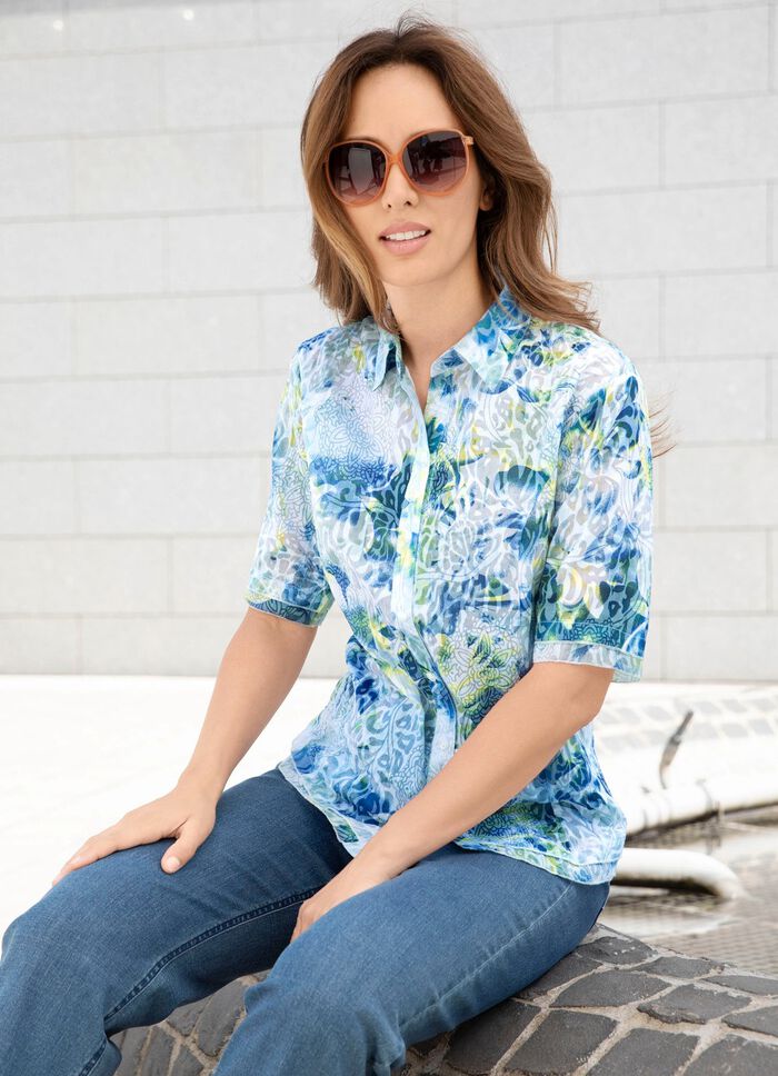 Fint genomskinlig blus 