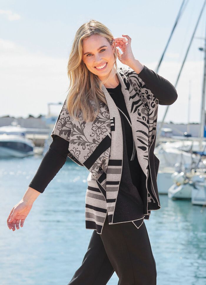 Poncho med elegant jacquarddesign 