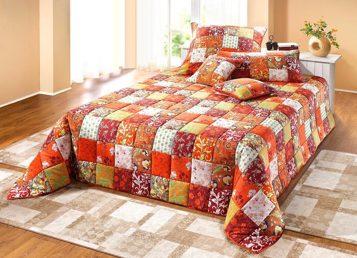 &Ouml;verkast och kuddfodral i patchworkdesign av bomull 