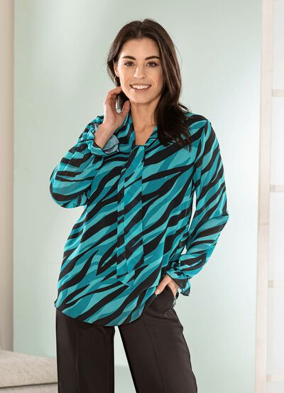 Blus med knytband i halsringningen 