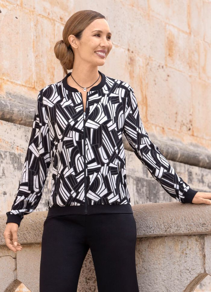 Blusjacka med svarta ribbade &auml;rmslut 