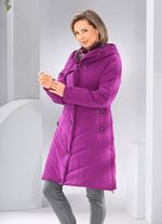 Kort kappa tillverkad av &aring;tervunna fibrer 