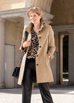 Kort rock med uppst&aring;ende krage 