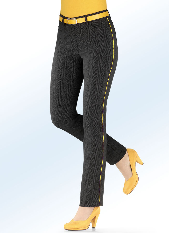 Byxor i en subtil fiskbenslook 