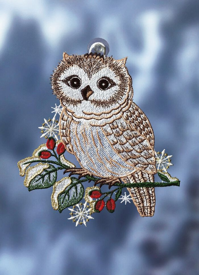 F&ouml;nsterbild sn&ouml;uggla gjord av &auml;kta Plauenspets 