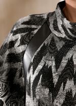 Ponchotr&ouml;ja i mjukt, b&ouml;ljande material 