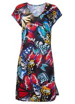 Kl&auml;nning med bl&auml;ckstr&aring;letryck och nedhasade &auml;rmar 