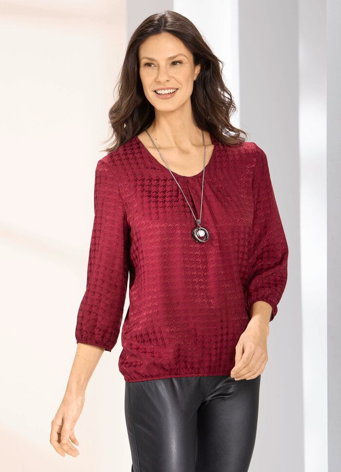 Tunika av gl&auml;nsande jacquard 