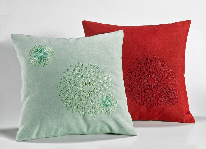 Bords- och rumsdekoration med genomarbetade broderier 