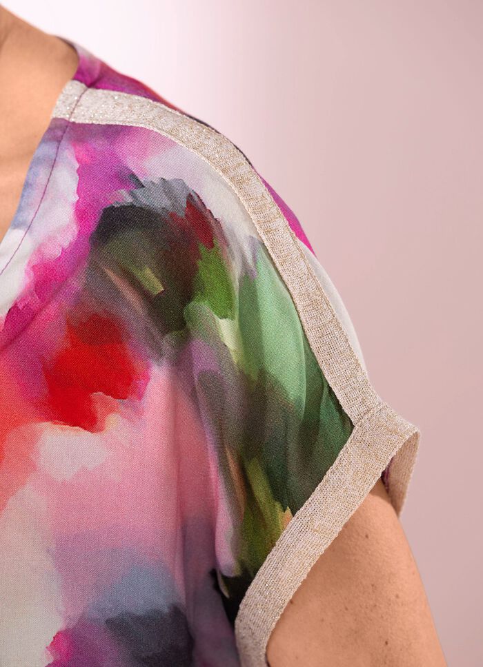 Tunika med gl&auml;nsande band 